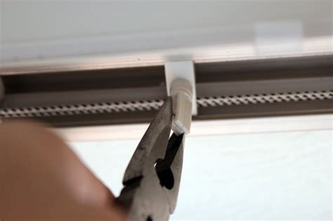 Spacing chain connector - this connects and secures the spacing. . Vertical blinds replacement clips